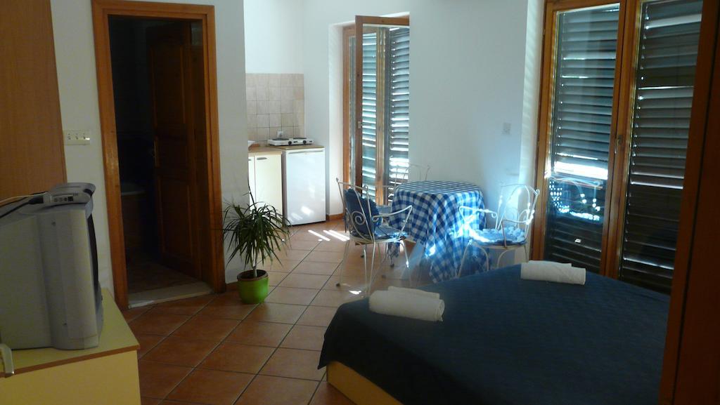 Guest House Zivkovic Ilha Sveti Stefan Quarto foto